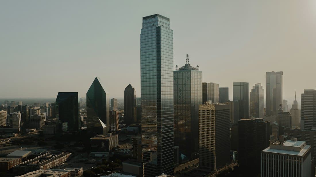 The downtown Dallas, Texas skyline at sunrise