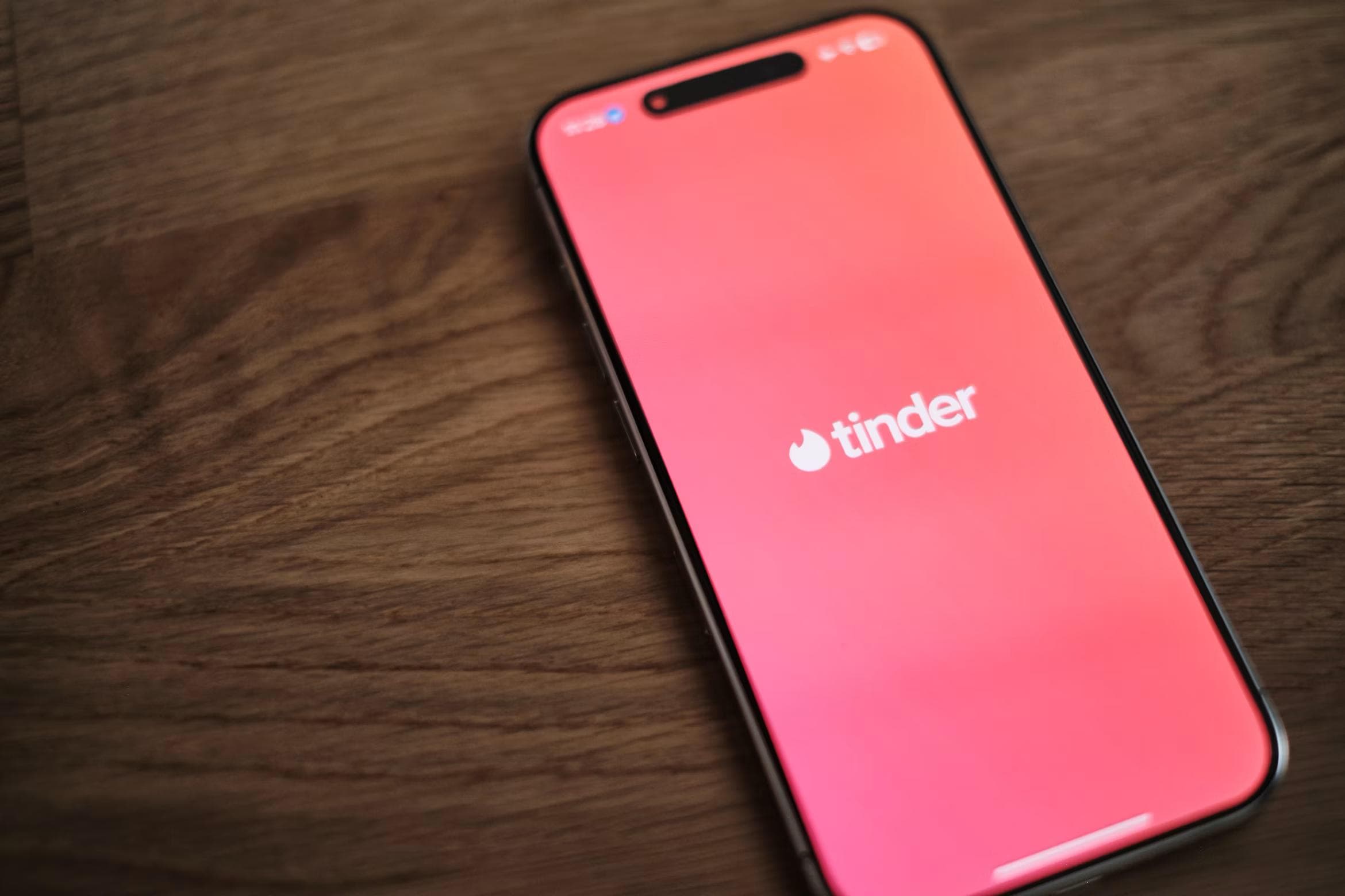 A hesitant man hiding behind a corner, representing the dating app burnout, emotional exhaustion, and frustration single men experience in modern dating.
